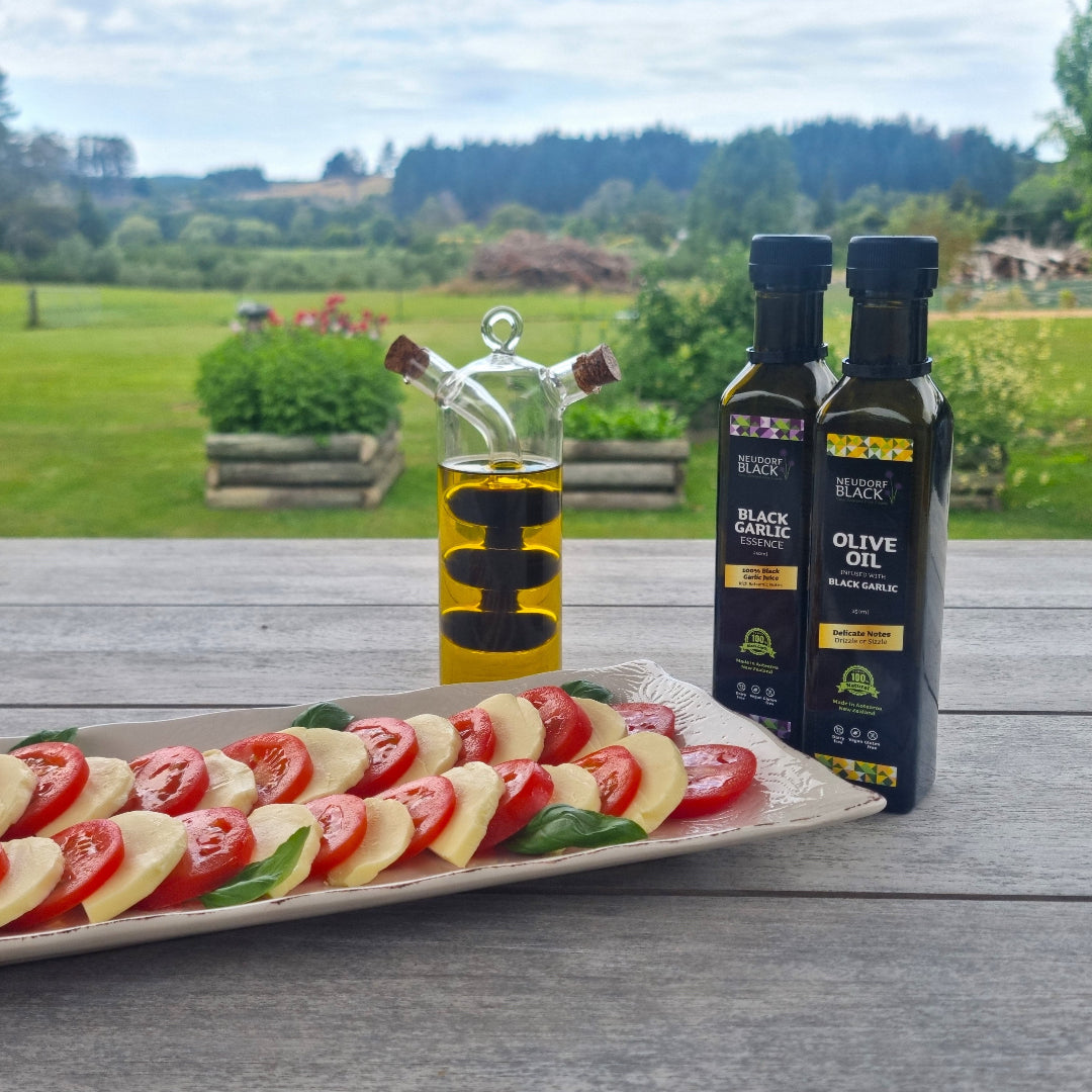 Black Garlic Essence with cheese and tomatoes