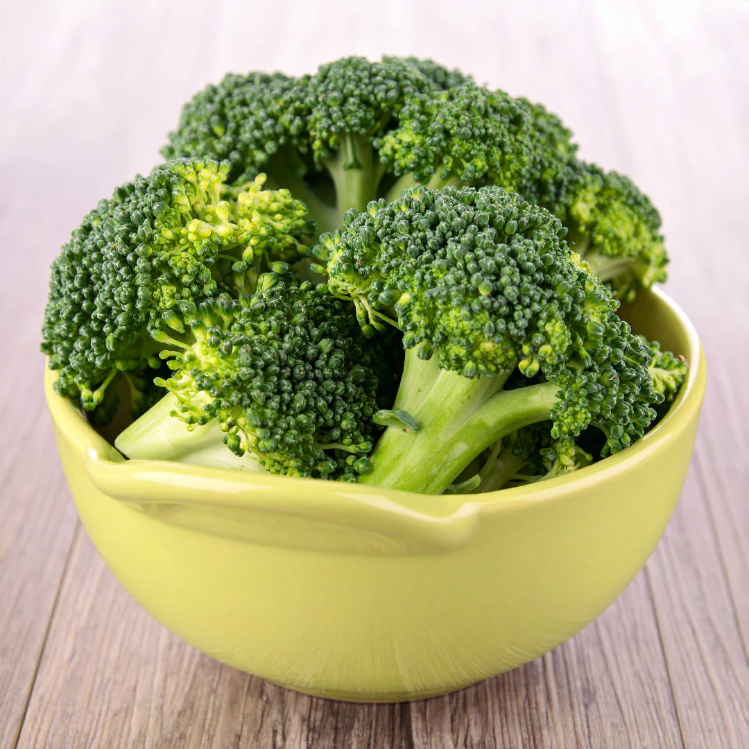 Broccoli Florets in a small yellow bowl