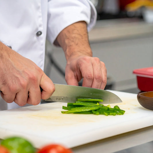 Chef Slicing Green Capsicum Batons