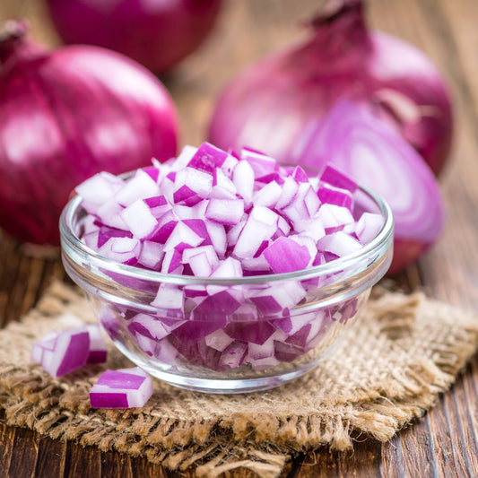 Diced Red Onions in a Glass Bowl