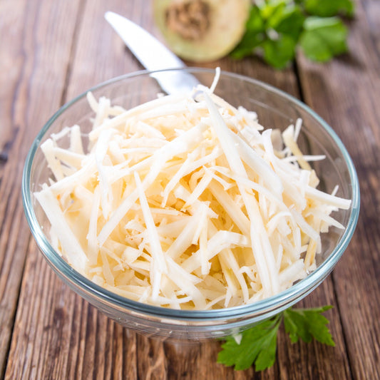 Grated Celeriac in a Glass Bowl
