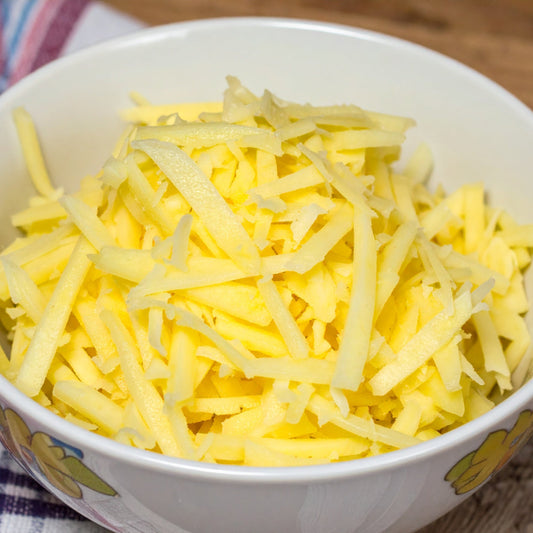 Grated Potato in a white ceramic bowl
