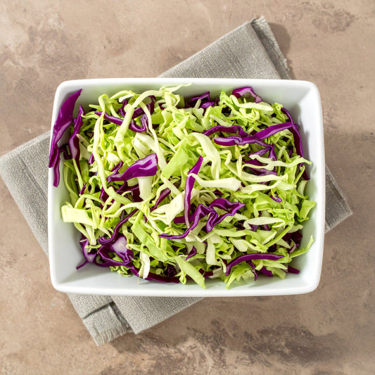 Green and Red Shredded Cabbage in a square bowl