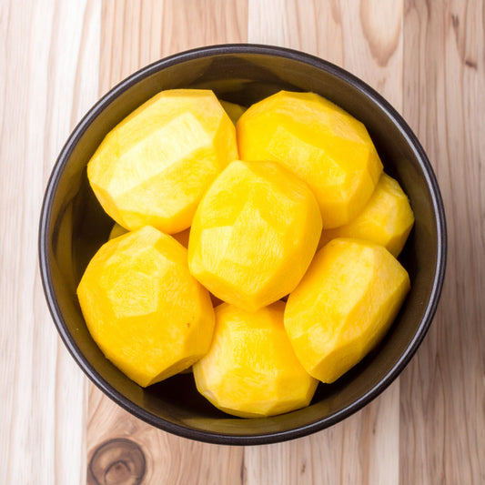 Peeled Gold Beetroot in a black bowl