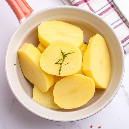 Sliced Potato in a white ceramic bowl