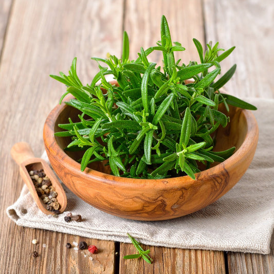 Taragon Herb in a wooden bowl with pepper