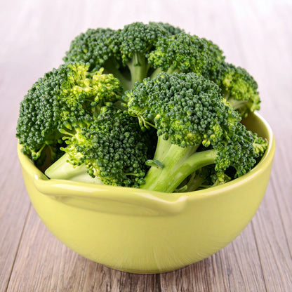 Broccoli Florets in a small yellow bowl
