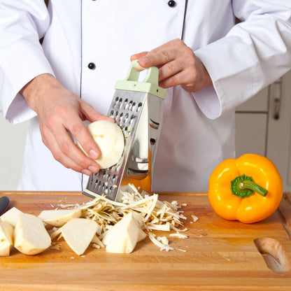 Chef grating celeriac