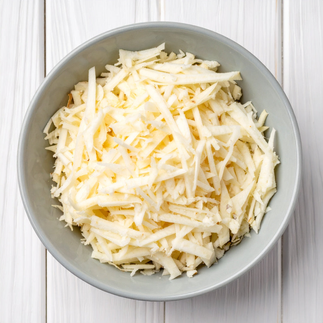 Grated Celeriac in a Grey Bowl