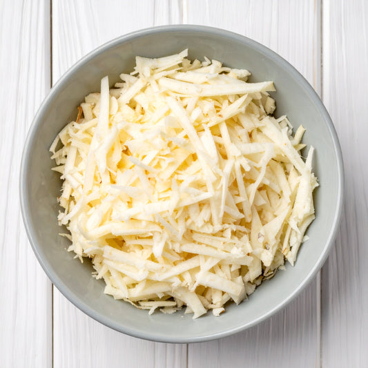 Grated Celeriac in a Grey Bowl