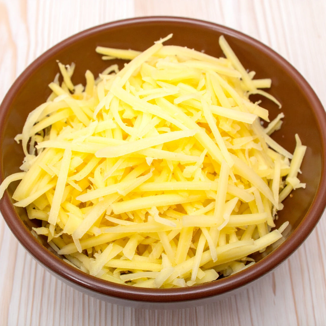 Grated Potato in a Brown Ceramic Bowl