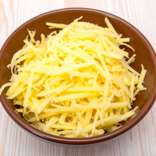 Grated Potato in a Brown Ceramic Bowl