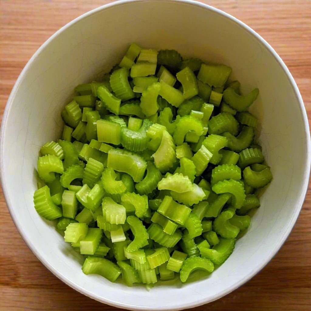 Sliced Celery in a White Bowl