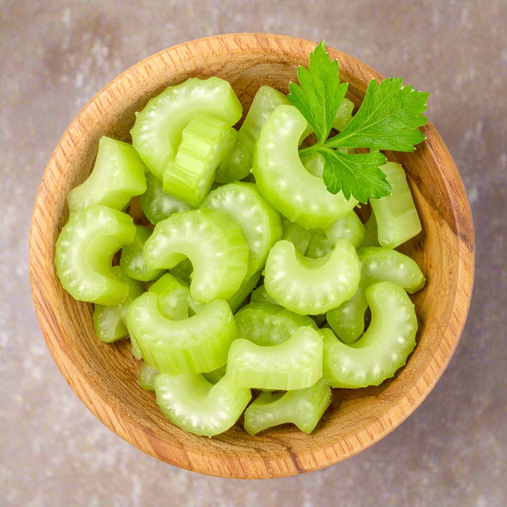 Sliced Celery in a wooden bowl